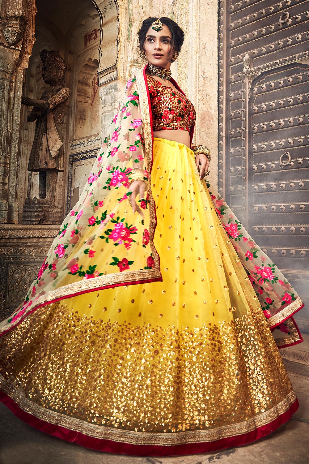 Yellow Net Lehenga Choli with Floral Embroidery