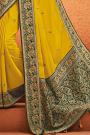 Yellow Party Wear Woven Silk Saree with Peacock Motifs