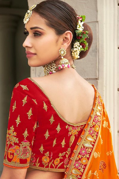 Beautiful Red and Orange Silk Lehenga Choli with Zari Detailing