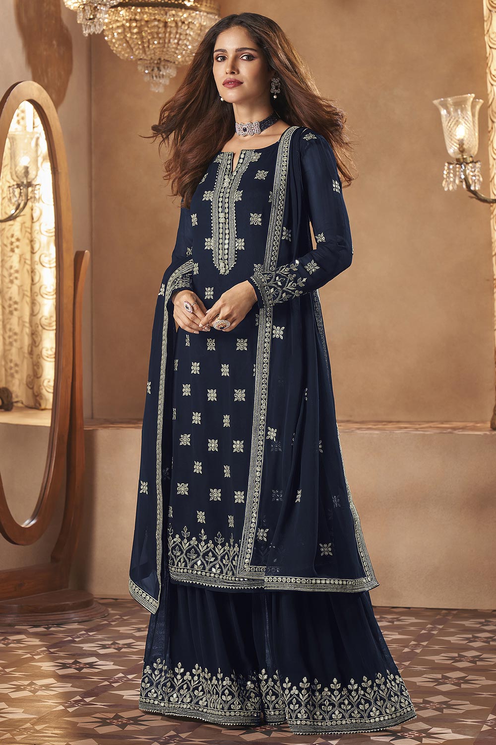 Royal blue embroidery shirt with white gharara.