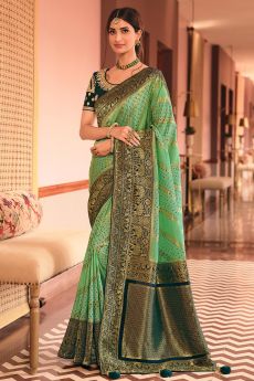Pastel Green Banarasi Silk Saree With Deep Teal Blue Border