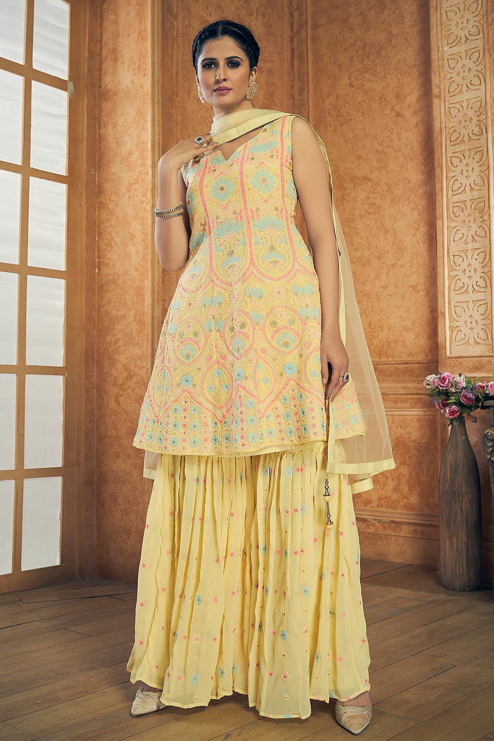 Light Yellow Georgette Embroidered Peplum Style Sharara Suit