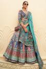 Turquoise & Multicolor Woven Silk Embroidered Lehenga Set With Belt