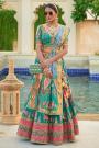 Teal & Multicolor Woven Silk Embroidered Lehenga Set With Belt