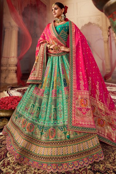 Aqua, Pink & Multicolor Banarasi Silk Embroidered Lehenga Set With Belt & Bag