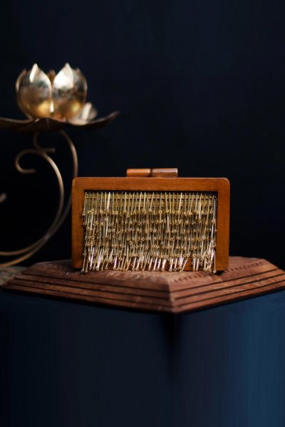 Wooden Clutch Bag With Gold Tassel Detail