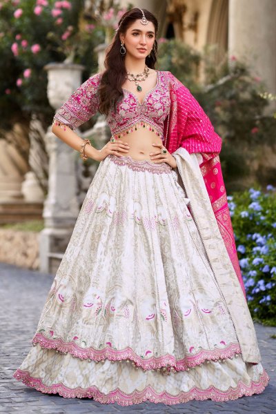 Ivory & Magenta Pink Banarasi Silk Zari Woven & Embroidered Layered Lehenga Set Ivory & Magenta Pink Banarasi Silk Zari Woven & Embroidered Layered Lehenga Set