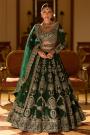 Bottle Green Silk Embroidered Luxurious Lehenga Set With Belt