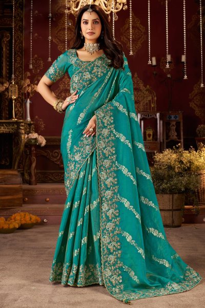Teal Tissue Silk Zari Woven & Embroidered Saree Teal Tissue Silk Zari Woven & Embroidered Saree