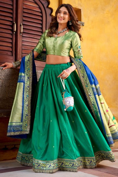Teal Green Paithani Silk Zari Woven & Hand Worked Lehenga Set With Potli Bag Teal Green Paithani Silk Zari Woven & Hand Worked Lehenga Set With Potli Bag