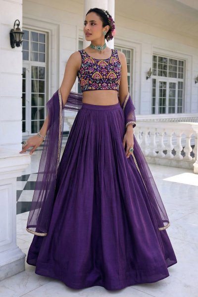Violet Silk Lehenga With Embroidered Blouse & Net Dupatta