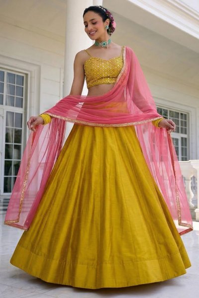 Mustard Yellow Silk Lehenga With Embroidered Blouse & Net Dupatta