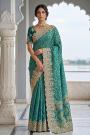 Teal Blue Banarasi Silk Embroidered & Laced Saree