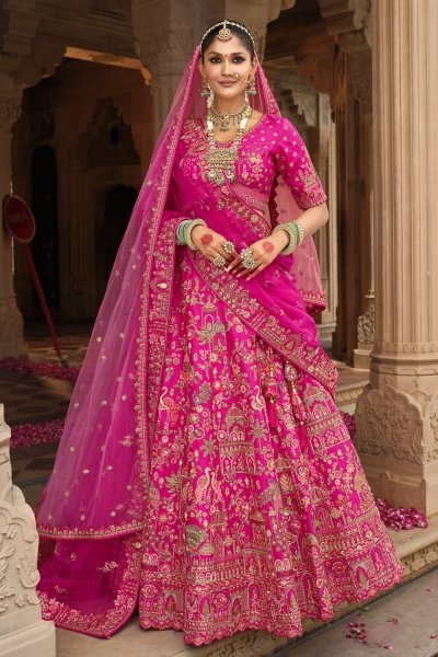 Magenta Pink Silk Embroidered Lehenga Set With 2 Net Dupattas Magenta Pink Silk Embroidered Lehenga Set With 2 Net Dupattas