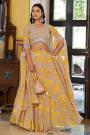 Beige And Mustard Georgette Printed And Embroidered Lehenga And Top With Cape And Potli Bag